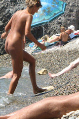 nudist girlfriend exhibits tiny tits